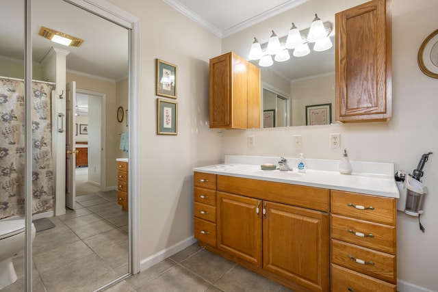 bathroom featuring tile patterned floors, ornamental molding, vanity, and toilet