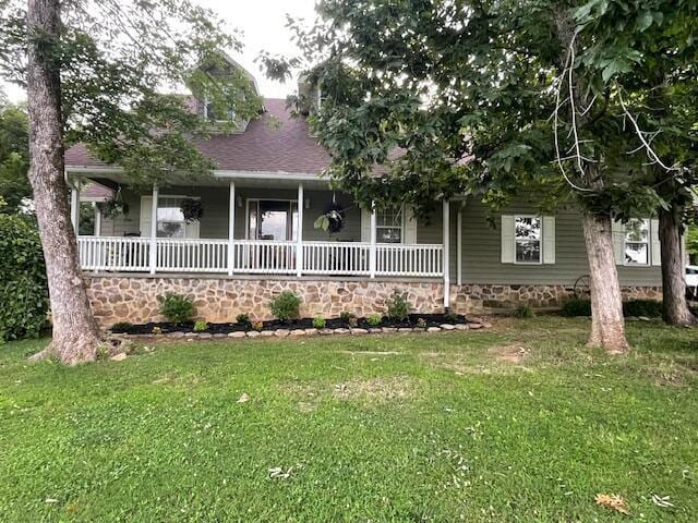 9415 Old State Highway 28, Pikeville, TN 37367 - view of front of house with a porch and a front lawn
