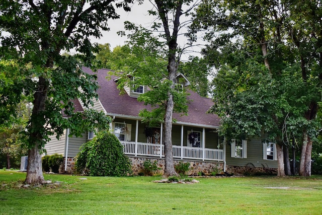 view of front facade with a porch and a front yard