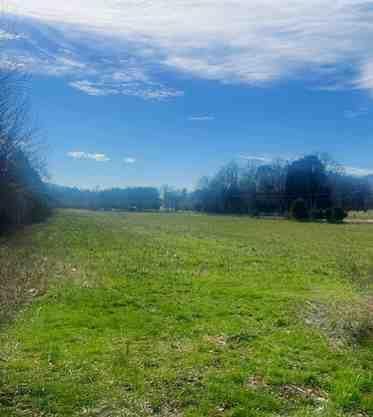 view of yard with a rural view