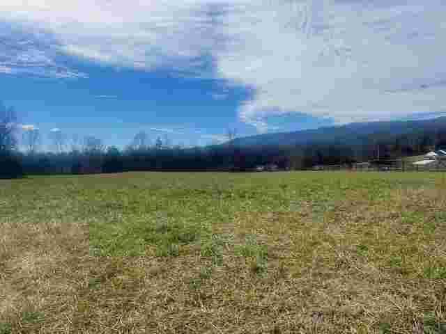 view of mountain feature featuring a rural view