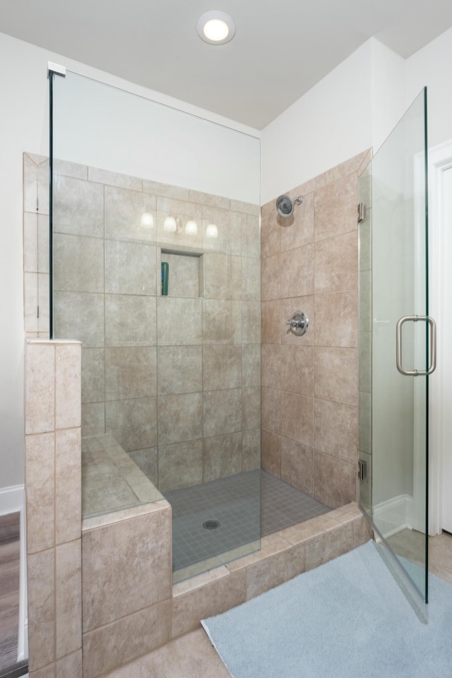 bathroom with an enclosed shower