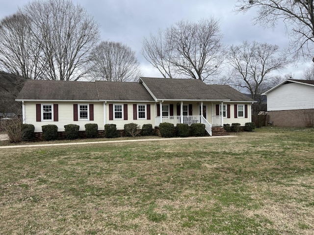 single story home featuring covered porch and a front lawn