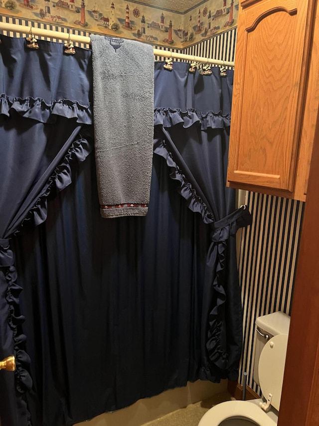 bathroom featuring toilet