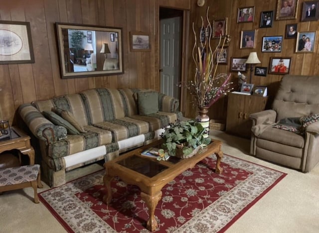 living room with carpet and wooden walls