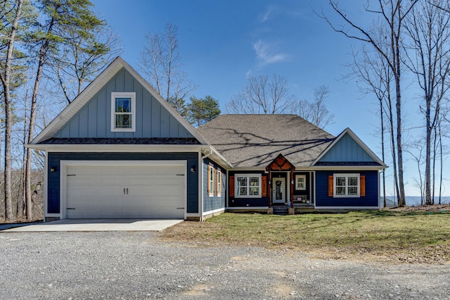 view of front of property featuring driveway, a garage, roof with shingles, a front lawn, and board and batten siding