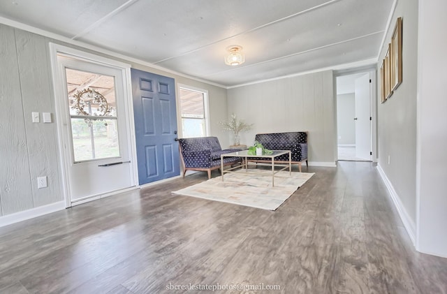 sitting room with hardwood / wood-style floors