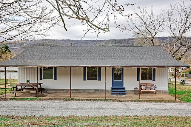 view of front of property featuring covered porch