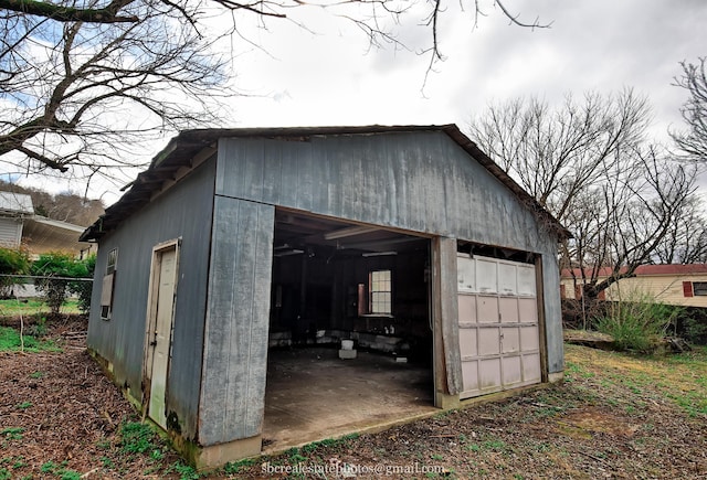 view of outdoor structure with a garage