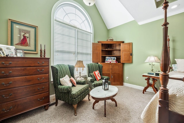 living area featuring baseboards, vaulted ceiling, a wealth of natural light, and light colored carpet