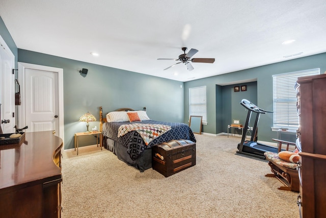 carpeted bedroom with recessed lighting, visible vents, ceiling fan, and baseboards