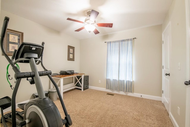 exercise room featuring carpet flooring and ceiling fan