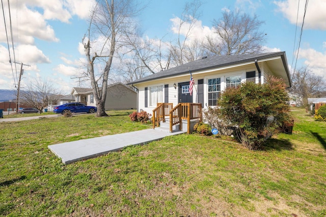 view of front of property with a front lawn