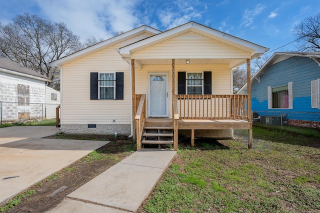 bungalow-style house featuring a front yard and a porch