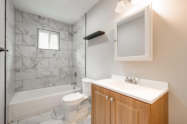 full bathroom featuring vanity, toilet, and tiled shower / bath combo