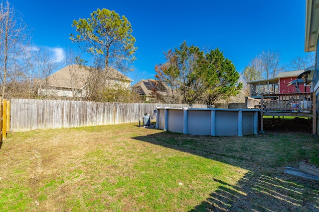 view of yard featuring a fenced in pool and fence private yard