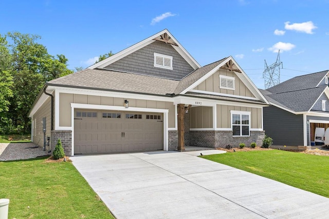 8892 Knolling Loop Unit 34, Ooltewah, TN 37363 - craftsman house with board and batten siding, a shingled roof, a garage, concrete driveway, and a front lawn