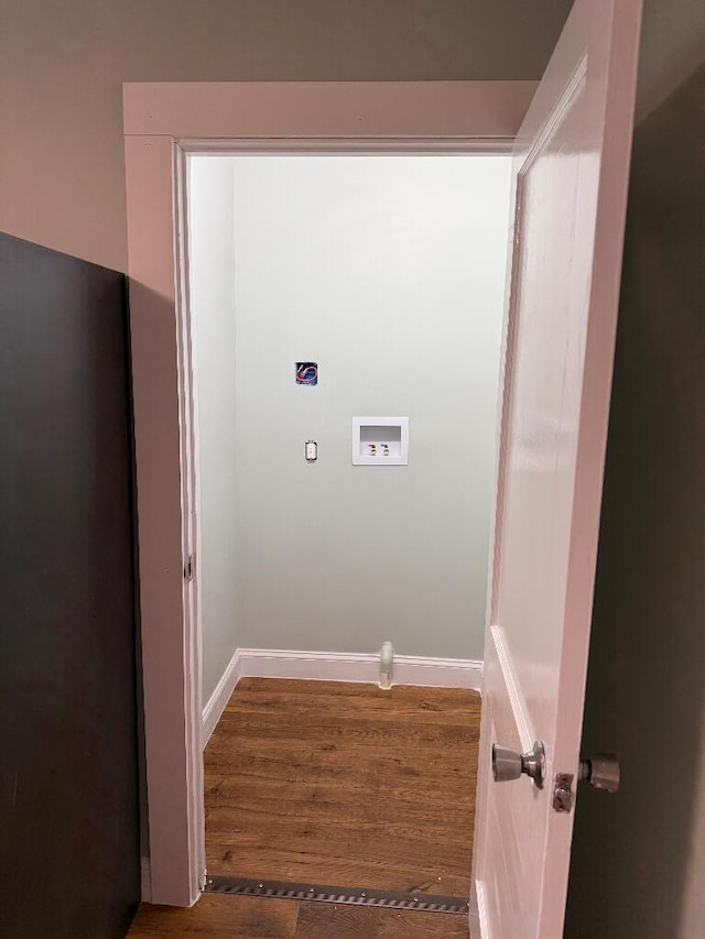 laundry room featuring hookup for a washing machine and dark wood-type flooring