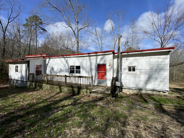 view of front of property with a deck