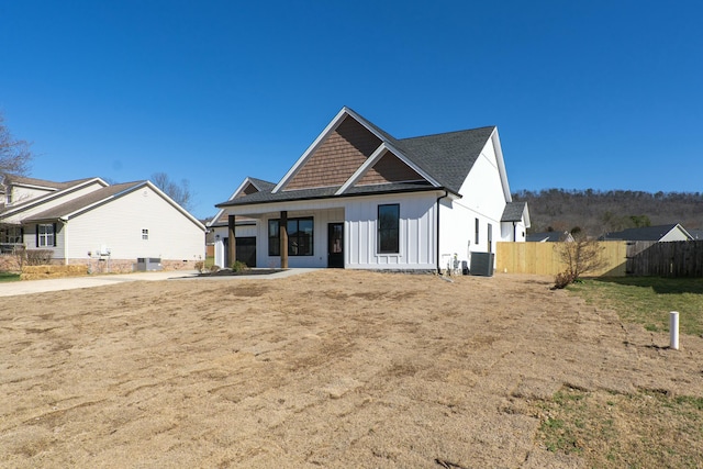 view of front of property featuring cooling unit