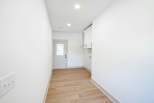 hallway featuring light wood-type flooring