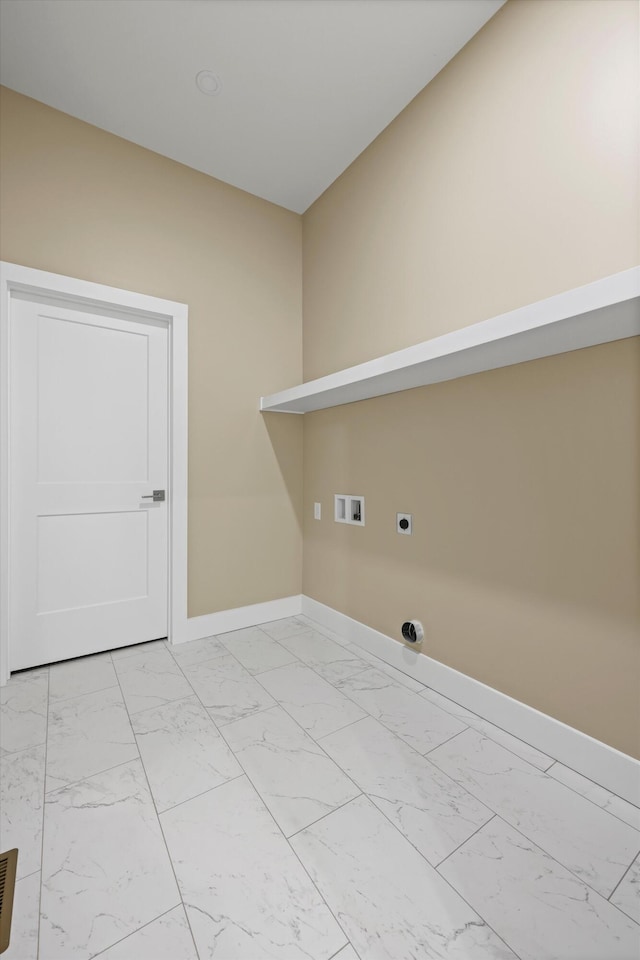 laundry area with marble finish floor, hookup for a washing machine, electric dryer hookup, laundry area, and baseboards