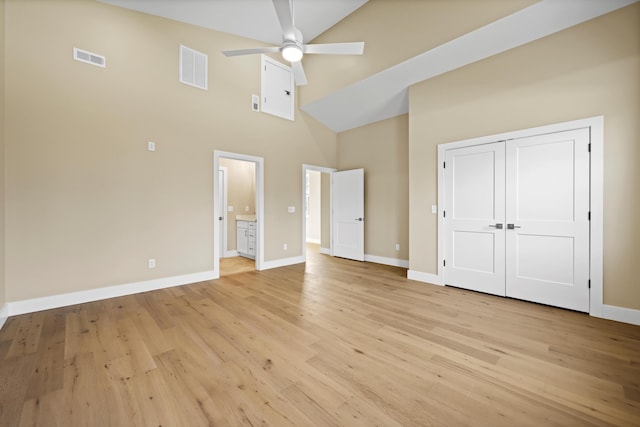 unfurnished bedroom with light wood-type flooring, baseboards, and visible vents