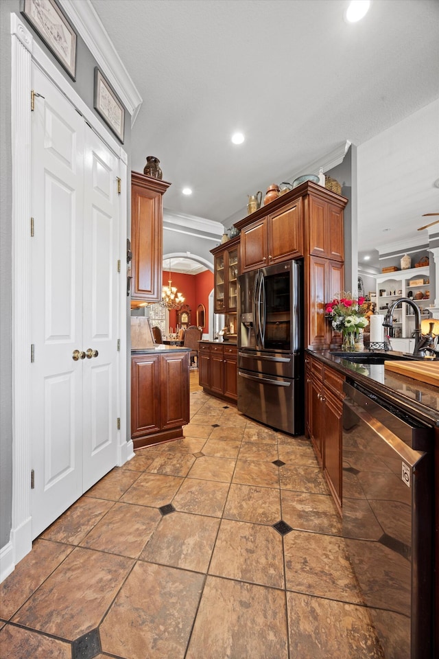 kitchen featuring arched walkways, a sink, black dishwasher, stainless steel fridge with ice dispenser, and dark countertops