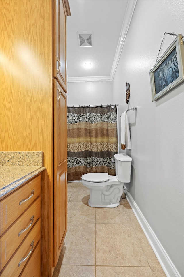 full bathroom with tile patterned flooring, toilet, vanity, baseboards, and crown molding