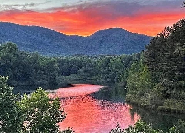 mountain view with a water view