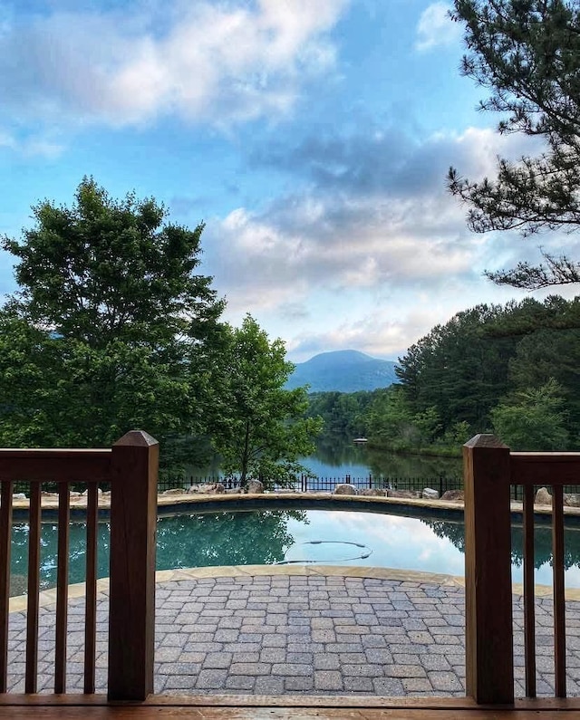 pool with a water and mountain view