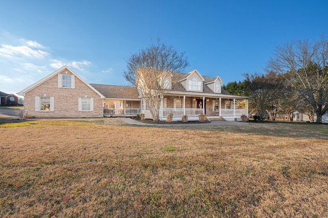 view of front of house featuring a front yard and a porch