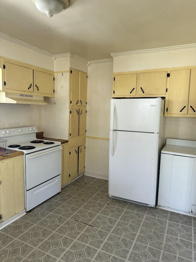 kitchen with white appliances, light brown cabinetry, crown molding, and washer / clothes dryer