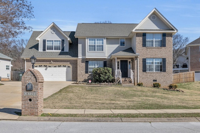 view of front of house featuring a garage and a front yard