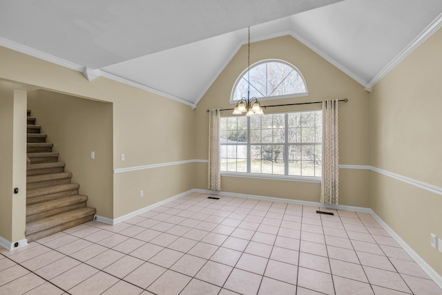 spare room with vaulted ceiling, ornamental molding, and a chandelier