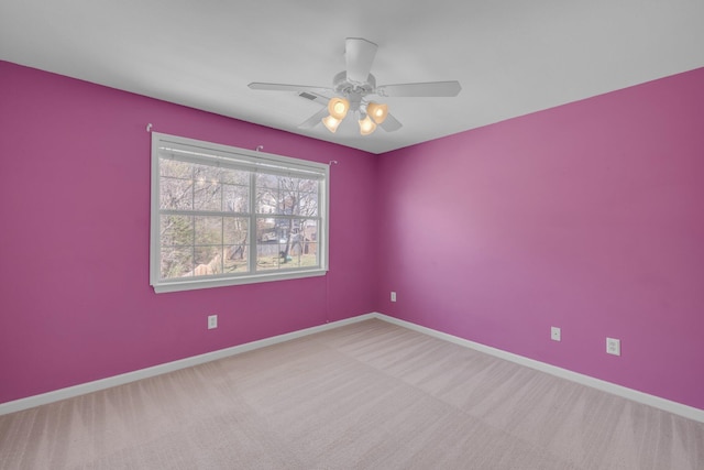 carpeted empty room with ceiling fan