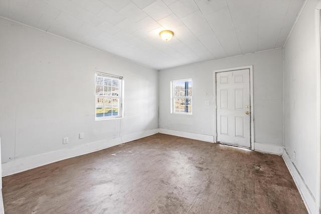 unfurnished room with a healthy amount of sunlight