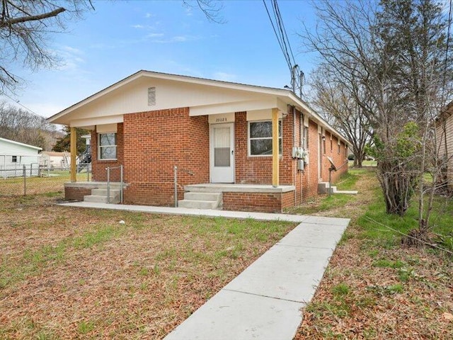 bungalow with a front yard