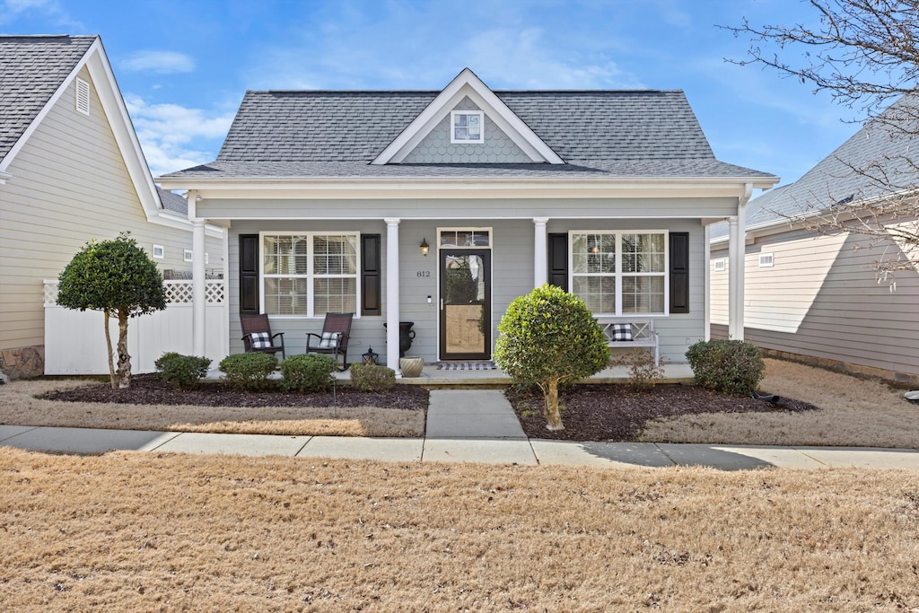 812 Callaway Ct, Chattanooga, TN 37421 - bungalow-style house with a shingled roof and covered porch