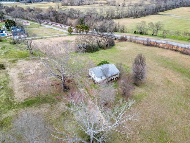 birds eye view of property featuring a rural view