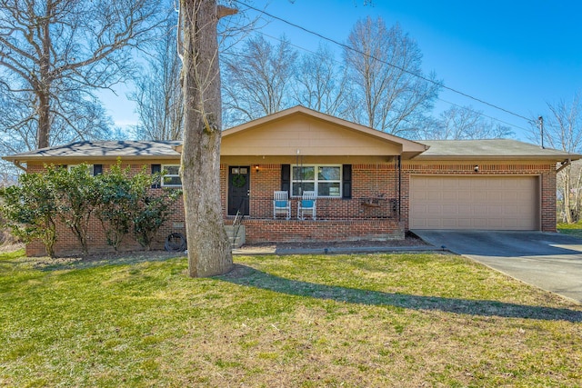 ranch-style house with driveway, an attached garage, covered porch, a front lawn, and brick siding