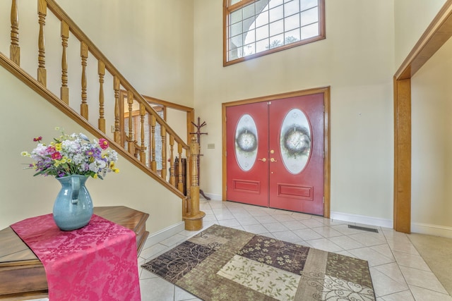 815 Battlefield Park Dr, Dalton, GA 30720 - entrance foyer featuring a high ceiling and light tile patterned floors