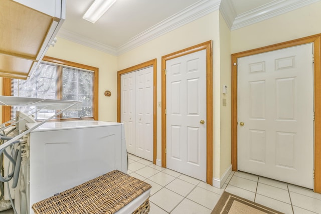 815 Battlefield Park Dr, Dalton, GA 30720 - kitchen featuring washer / clothes dryer, light tile patterned flooring, and ornamental molding