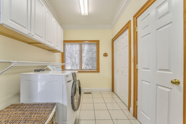 815 Battlefield Park Dr, Dalton, GA 30720 - clothes washing area featuring light tile patterned floors, cabinets, ornamental molding, and independent washer and dryer
