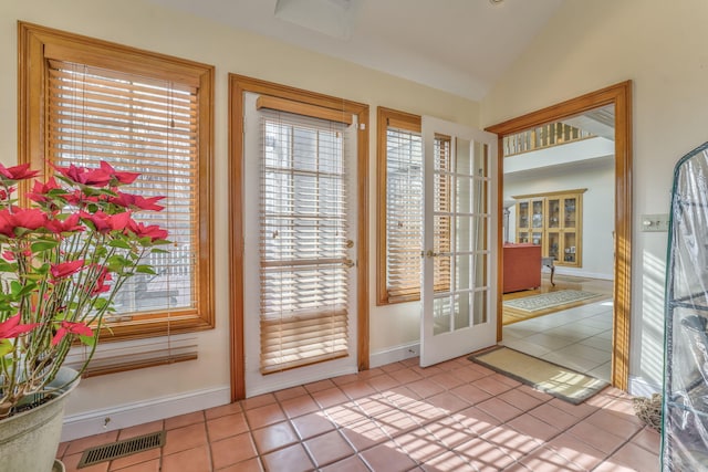 815 Battlefield Park Dr, Dalton, GA 30720 - doorway with lofted ceiling, light tile patterned floors, and french doors