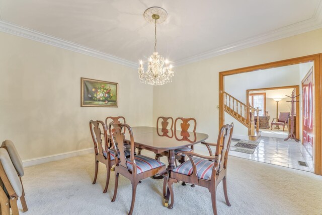 815 Battlefield Park Dr, Dalton, GA 30720 - dining room featuring crown molding, an inviting chandelier, and light carpet