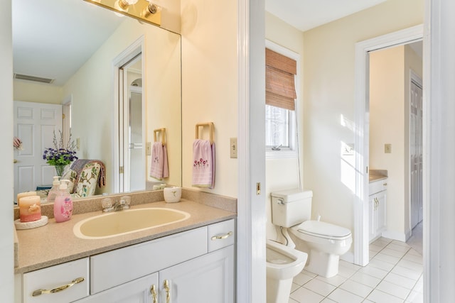 815 Battlefield Park Dr, Dalton, GA 30720 - bathroom with tile patterned flooring, a bidet, vanity, and toilet