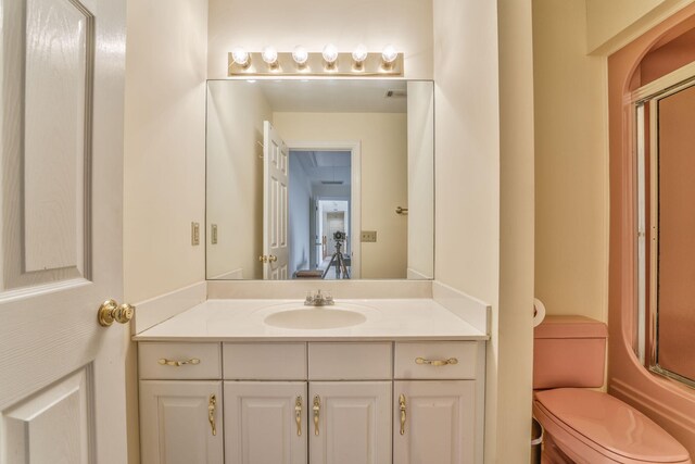 815 Battlefield Park Dr, Dalton, GA 30720 - full bathroom featuring vanity, bath / shower combo with glass door, and toilet