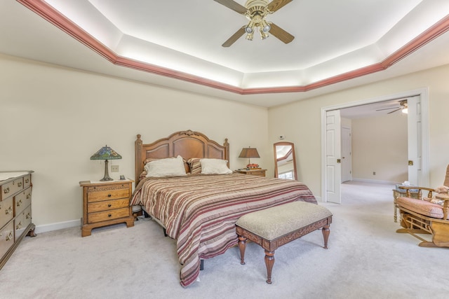 815 Battlefield Park Dr, Dalton, GA 30720 - bedroom featuring light colored carpet, ceiling fan, and a tray ceiling