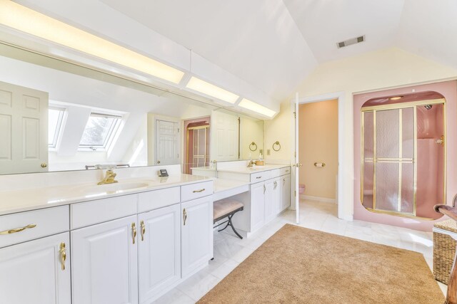 815 Battlefield Park Dr, Dalton, GA 30720 - bathroom featuring vanity, tile patterned floors, a shower with door, and vaulted ceiling with skylight